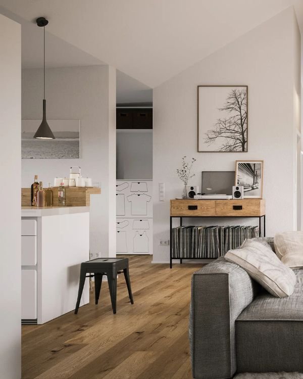 Rénovation intérieure d’appartement avec pièce de vie moderne, sol parquet et aménagement contemporain